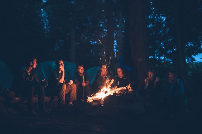 Group of people having a campfire