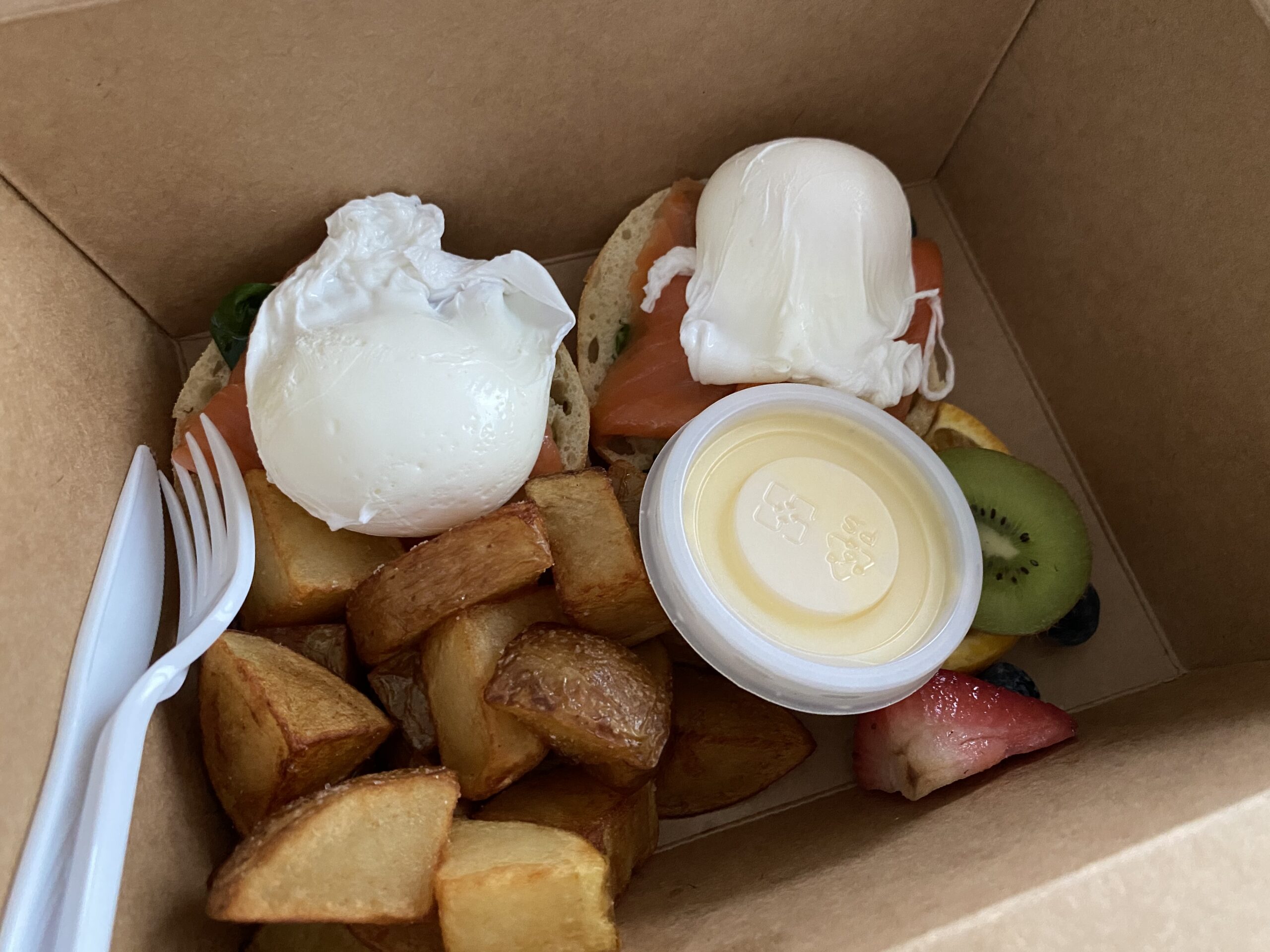 City staycation. Smoked salmon benny breakfast in a box at the Sheraton Vancouver Wall Centre hotel.