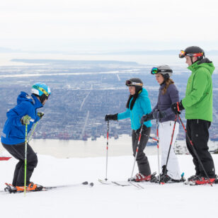 Taking a ski lesson on Grouse Mountain