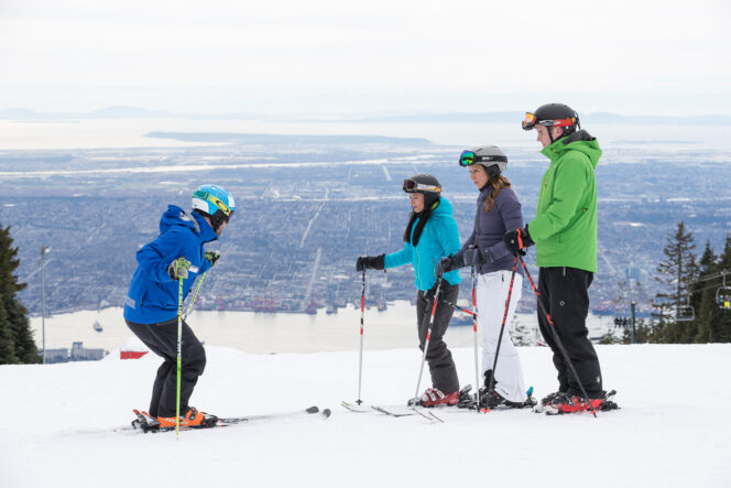Taking a ski lesson on Grouse Mountain
