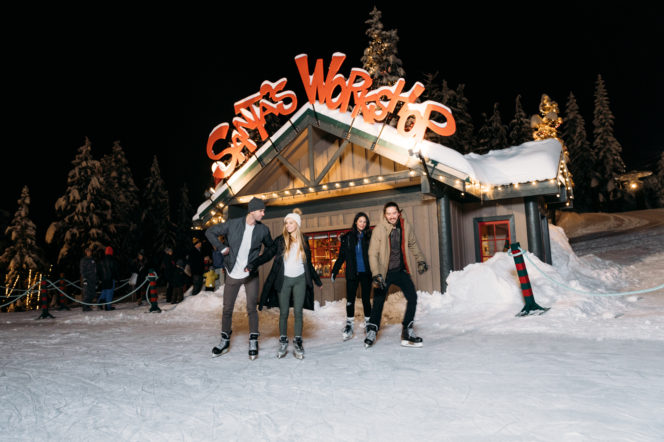 A group skating on a pond at Grouse Mountain in Vancouver at night
