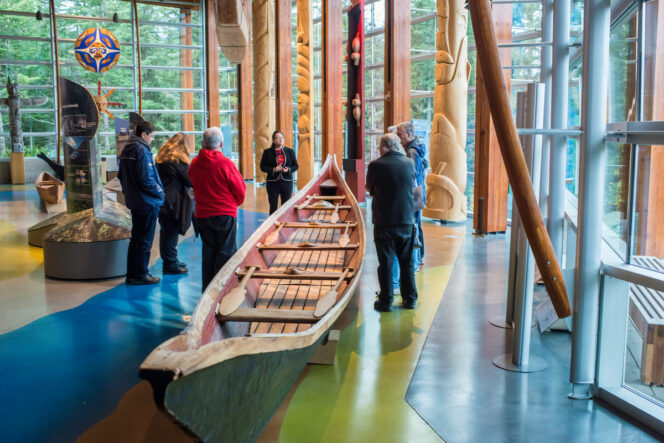 A tour group inside the Squamish Lil'wat Cultural Centre in Whistler