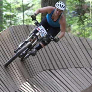 Deanne Cote of the North Shore Mountain Bike Association rides in Duthie Hill, Washington