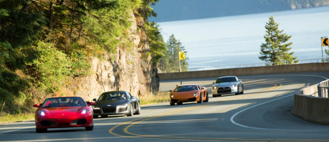 Exotic cars driving the Sea to Sky Highway near Vancouver with Scenic Rush