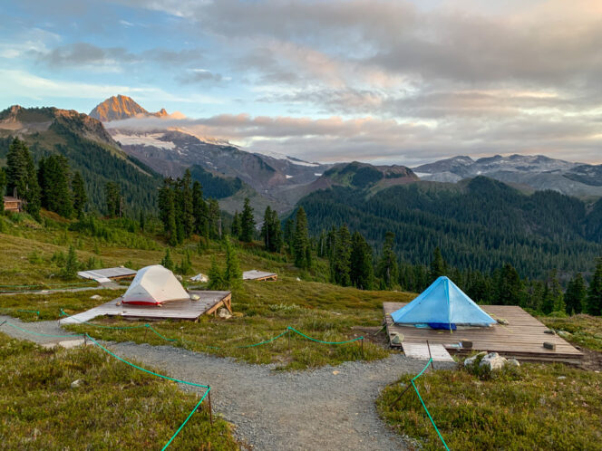Tents at the Elfin Lakes Campground with Mountain Garibaldi behind