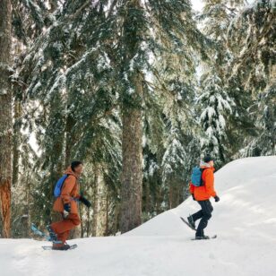 Two people snowshoeing at Grouse Mountain in Vancouver
