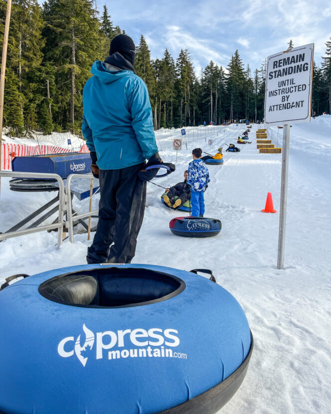Boarding the tube tow at Gnarly's Tube Park at Cypress Mountain