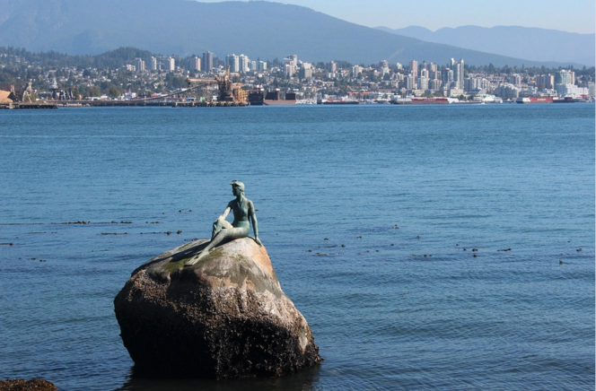 Girl in a wetsuit sculpture in Vancouver