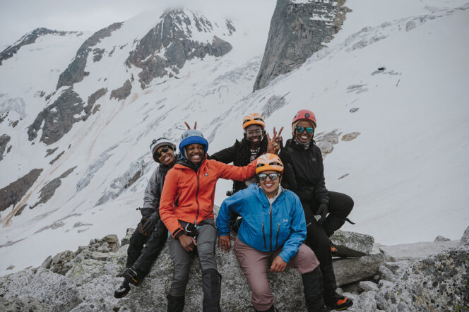 Still of five female mountaineers of colour from the film I Am Because You Are