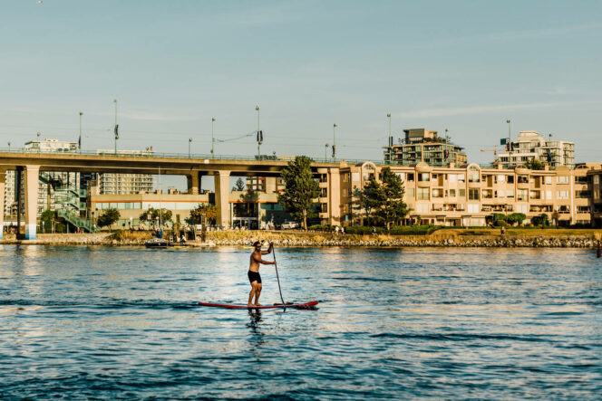 Stand-up paddleboarding in False Creek