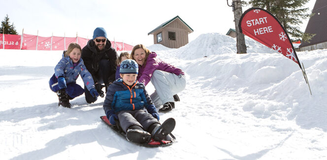 Family fun at the sliding zone on Grouse Mountain