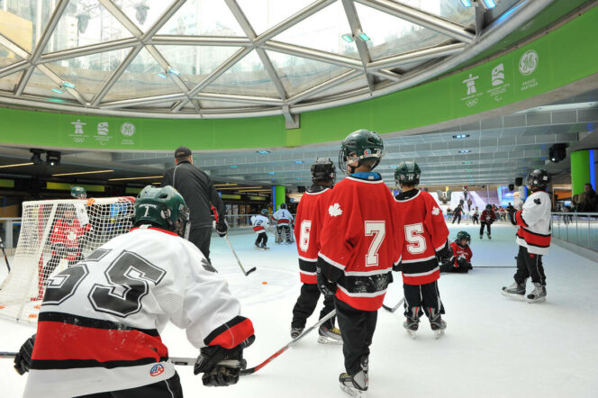 Children playing hockey at the Robson Square Ice Rink in Vancouver