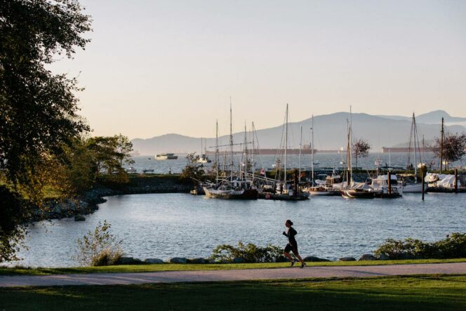 A runner on the oceanfront path at Vanier Park. 