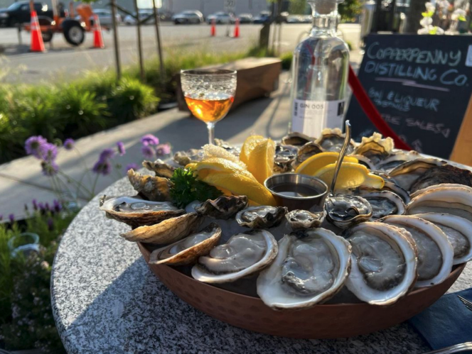 Oysters and gin on the patio at Copperpenny Distilling in North Vancouver